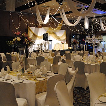 Wedding with tables, decor and stage