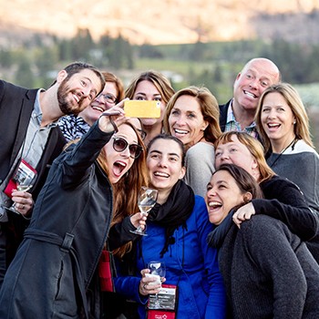 Delegates snap a selfie at an offsite in wine country